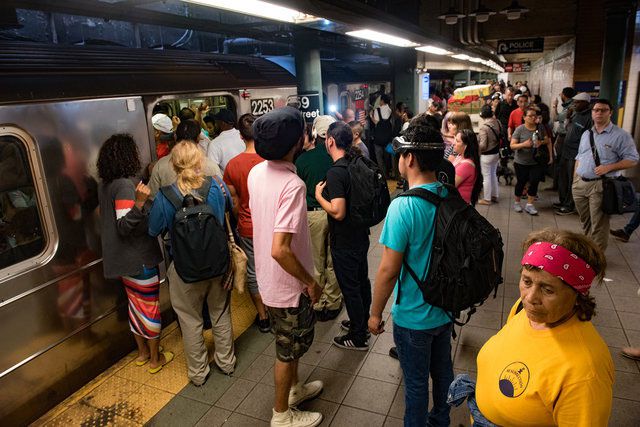 Commuters after the subway derailment on June 27, 2017